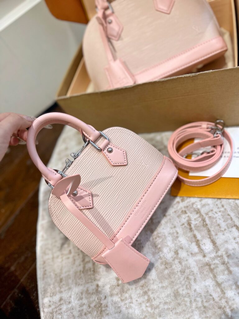 Louis Vuitton Alma Bb Pink Leather Handbag editorial product context 2