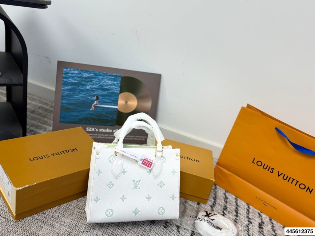 Louis Vuitton On The Go White Leather Tote Bag editorial product context 2