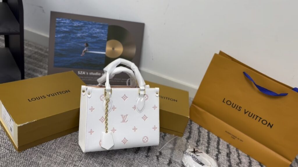 Louis Vuitton Onthego White Leather Tote Bag editorial product context 1