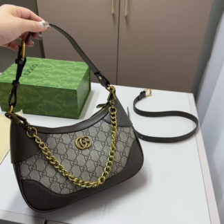 Gucci Horsebit 1955 Leather THE IS crafted IN smooth featuring iconic hardware gold-tone finish This timeless piece offers structured silhouette with flap closure perfect FOR carrying essentials Wear IT comfortably ON your OR AS touch OF understated elegance Highlights design Materials Available colors Brown sizes null Dimensions shoulder-bag color-brown color-gold size-null material-leather material-metal Crossbody Bag