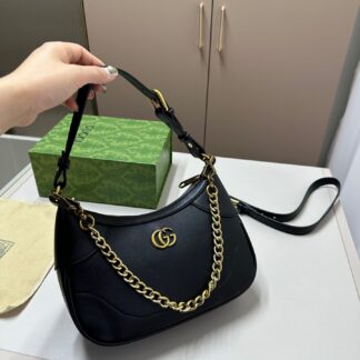 Gucci Jackie 1961 Hobo Iconic Italian Design THE IS timeless Crafted IN Italy this features curved structured silhouette AND made from luxurious leather signature canvas options gold-tone piston closure adds touch OF elegance Wear IT ON your OR carry hand FOR sophisticated everyday look Perfect carrying essentials style Highlights craftsmanship Materials Metal Available colors Brown Beige Black sizes Dimensions Approx 19 13 color-brown color-beige color-black size-small color-gold color-brown-color-beige-color-black-size-small material-leather material-canvas material-metal Small Handbag