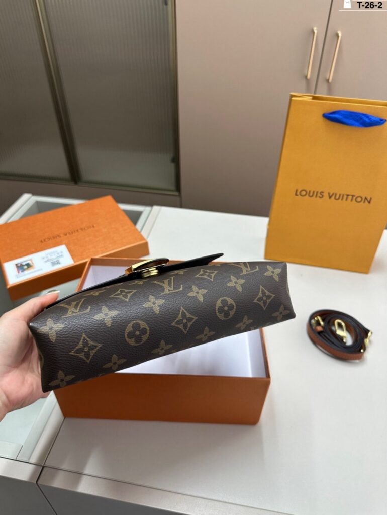 Louis Vuitton Locky Gold Leather Handbag editorial product context 3