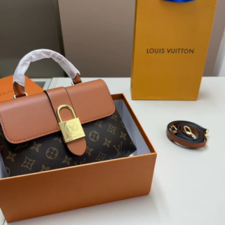 Louis Vuitton Pre-Owned This offers timeless style AND luxury Crafted from durable canvas with signature monogram complemented BY supple leather trim sturdy TOP handles Accented gold-tone hardware Perfect FOR everyday essential carrying Highlights Materials color-gold material-canvas material-leather material-metal Handbag
