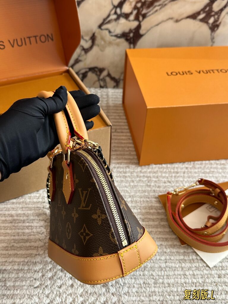 Louis Vuitton Alma Gold Leather Handbag editorial product context 3