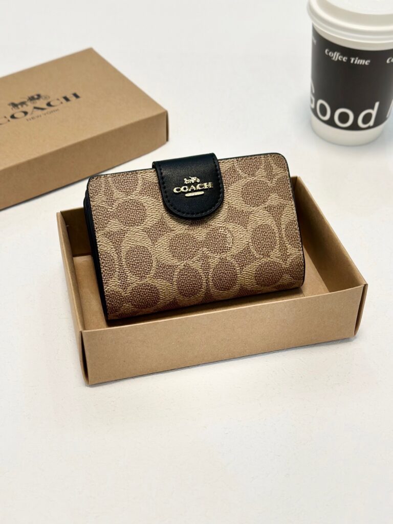 Coach Gold Leather Wallet editorial product context 2