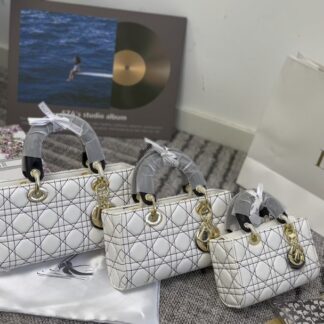 Designer Material Calfskin Hardware Gold tone Pattern Clutch 1.9 x