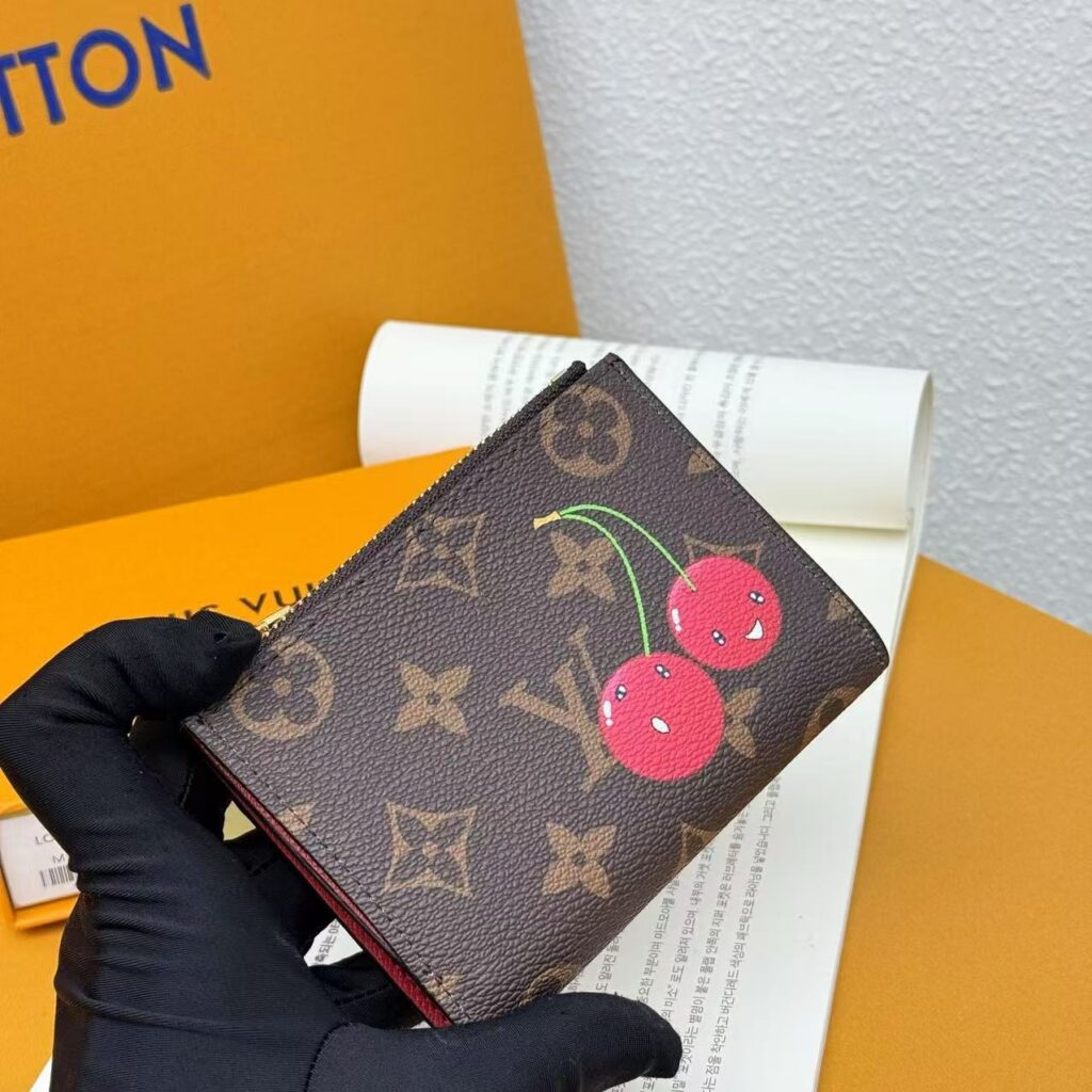Louis Vuitton Mportefeuille Lisa Monogram Black Calfskin Leather Wallet editorial product context 3
