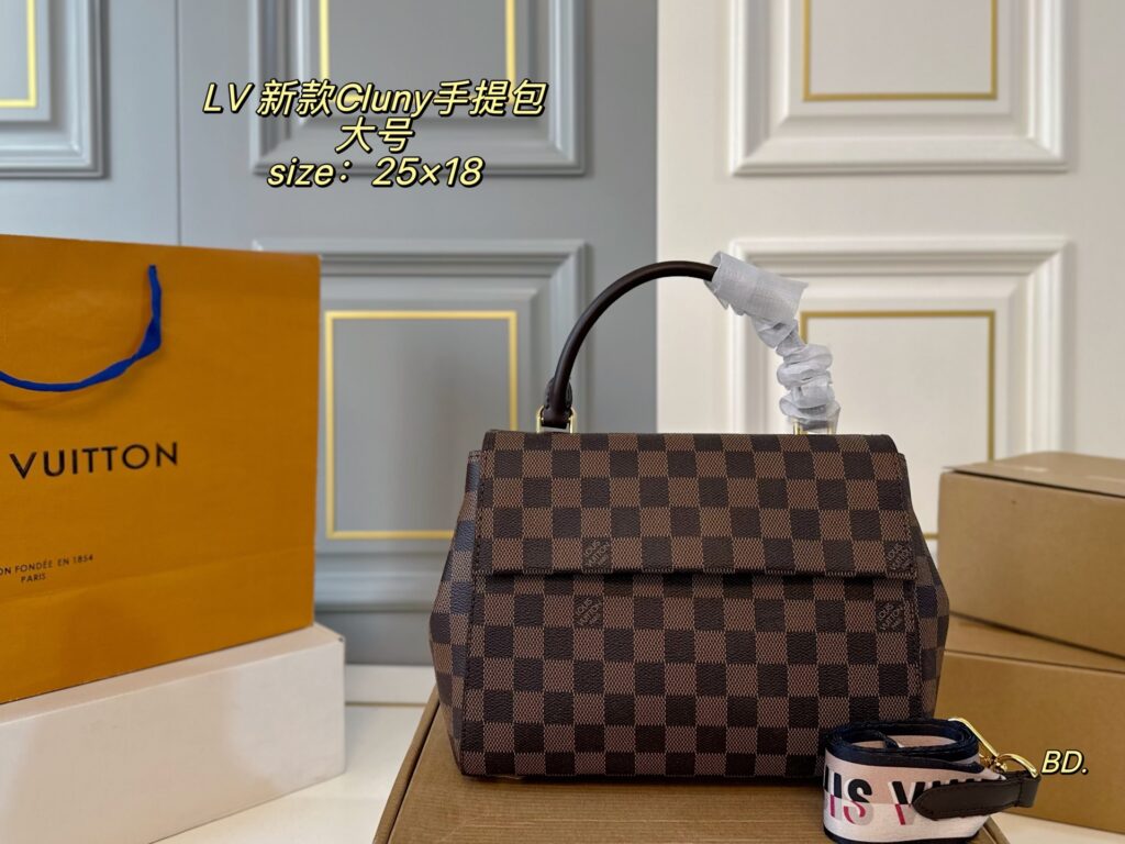 Louis Vuitton Cluny Large Black Calfskin Leather Clutch editorial product context 2