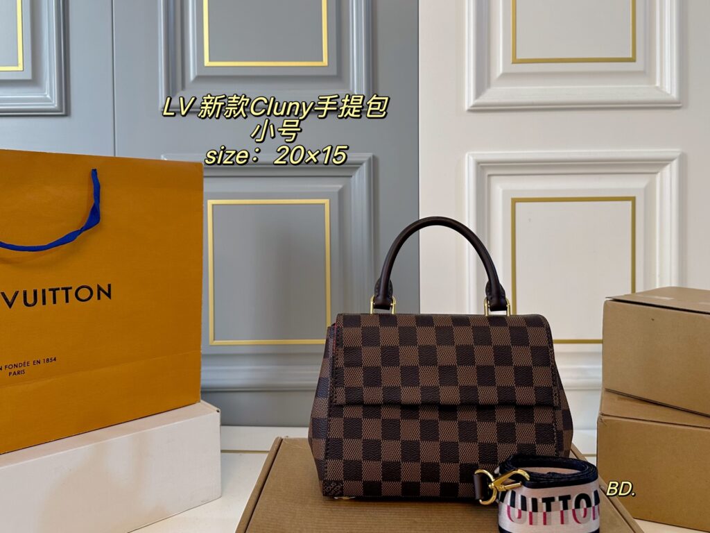 Louis Vuitton Cluny Small Black Calfskin Leather Clutch editorial product context 1