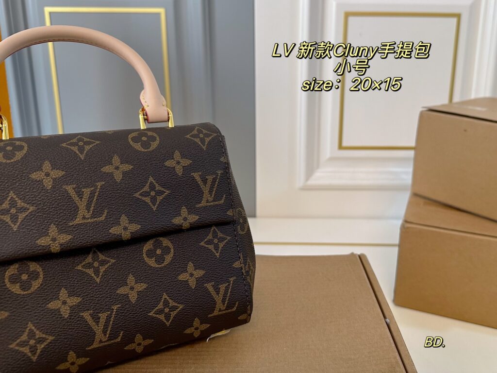 Louis Vuitton Cluny Small Black Calfskin Leather Clutch editorial product context 3