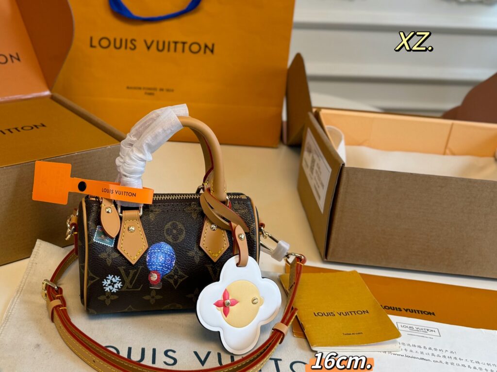 Louis Vuitton Nano Mini Black Calfskin Leather Clutch editorial product context 2