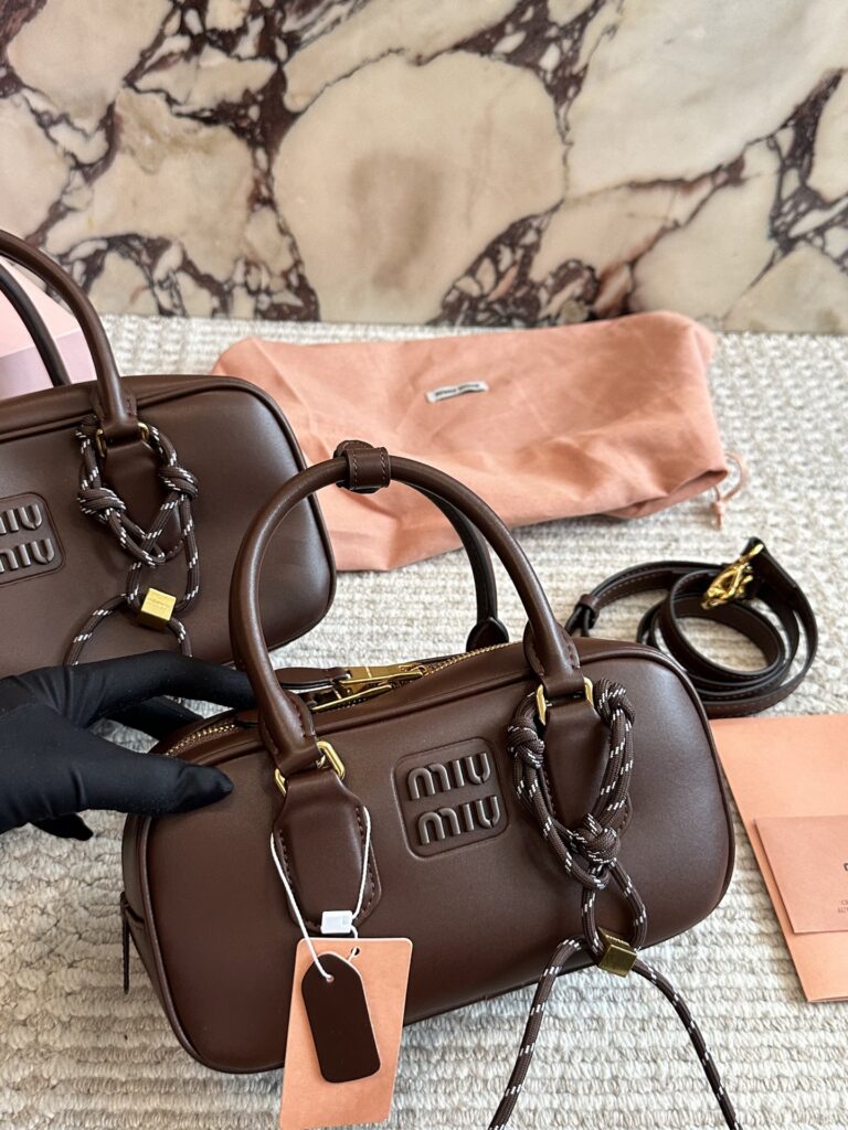 Miu Miu 185 175 22 27 Clutch 1.9 x 1.1 editorial product context 3