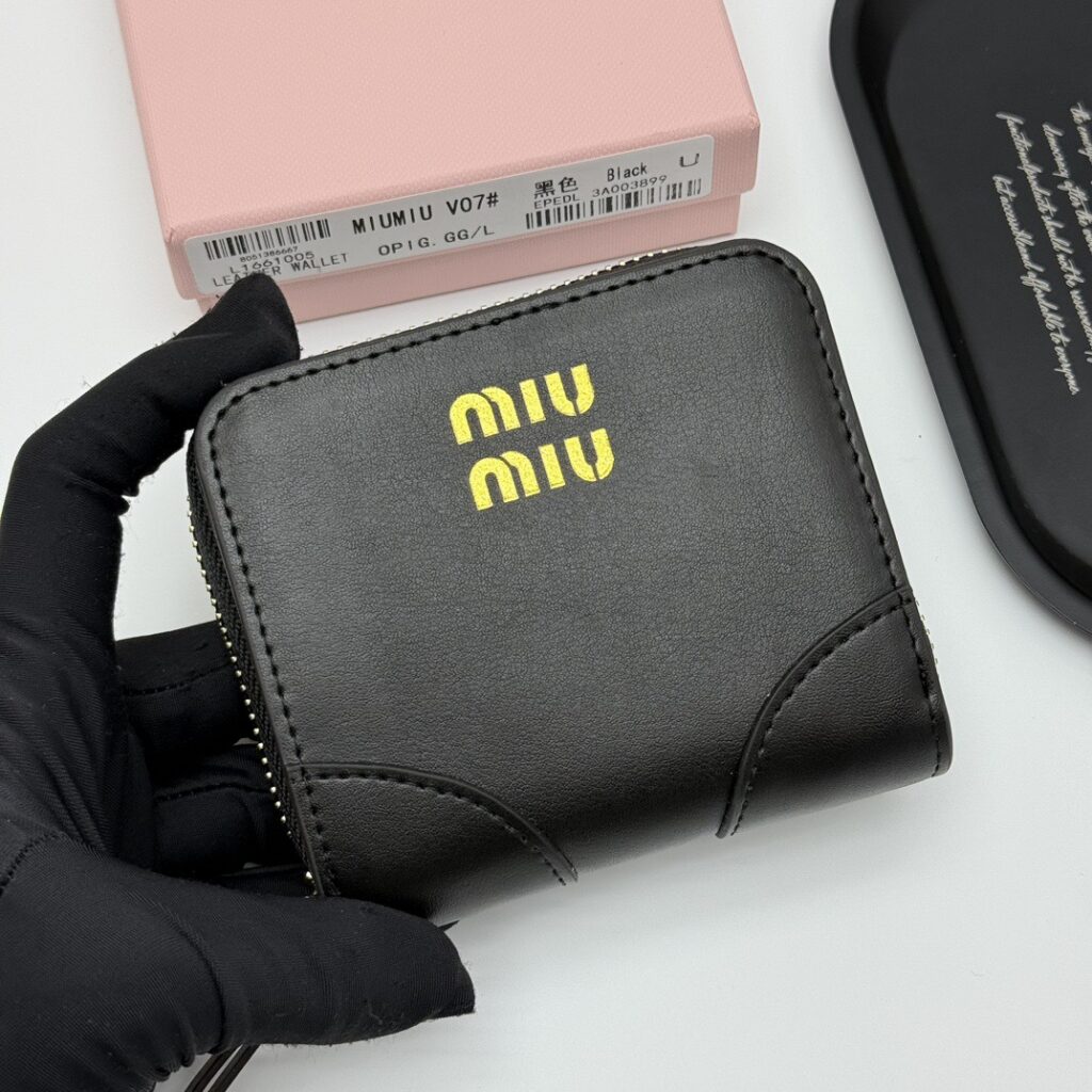 Miu Miu V07 10 Black Calfskin Leather Wallet editorial product context 2