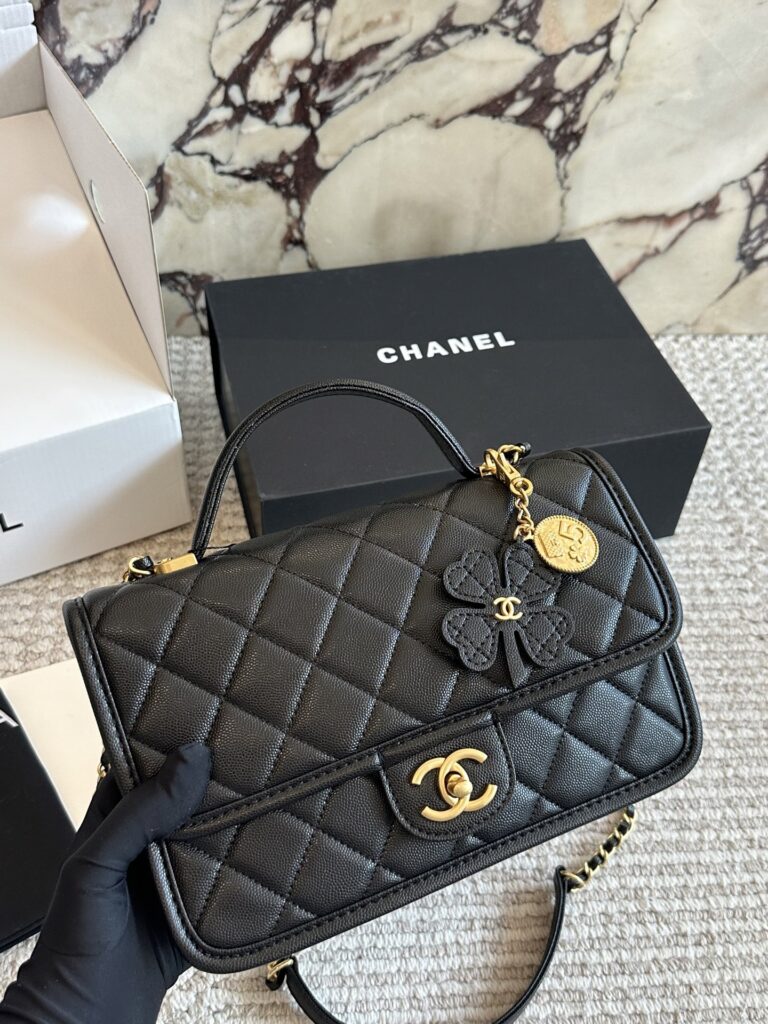Chanel 25 Small Black Calfskin Leather Clutch editorial product context 1