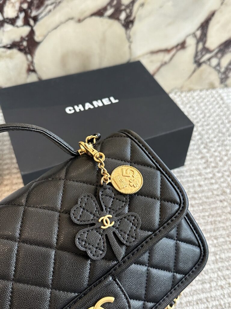 Chanel 25 Small Black Calfskin Leather Clutch editorial product context 2