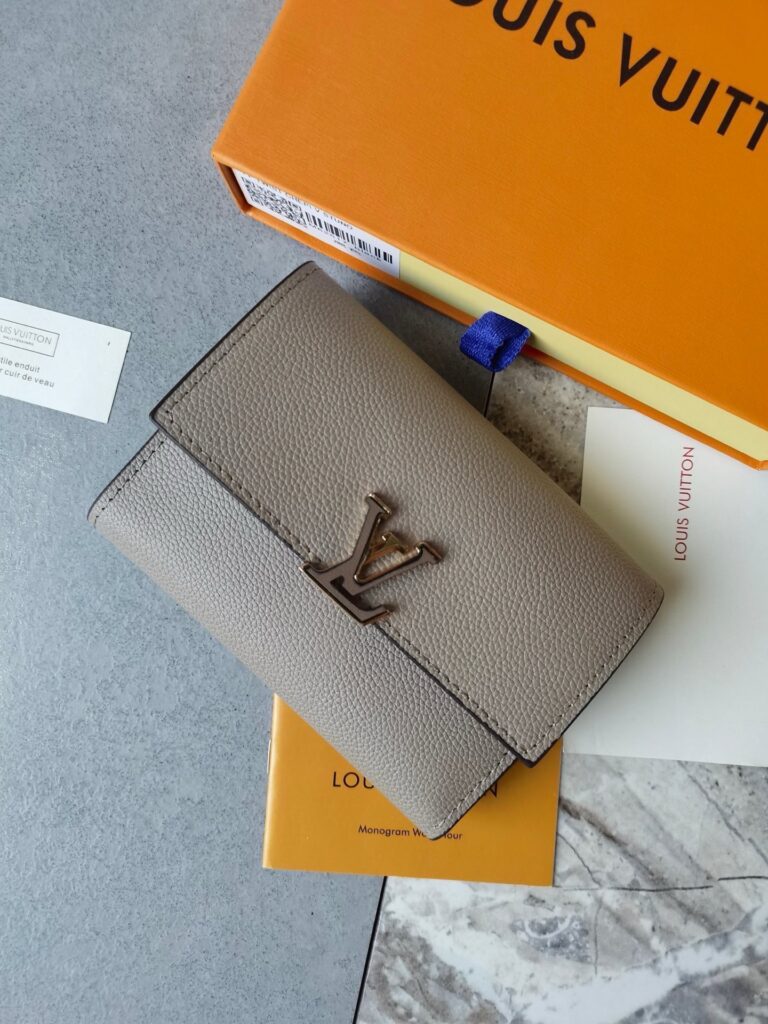 Designer Taurillon Capucines Black Wallet editorial product context 2