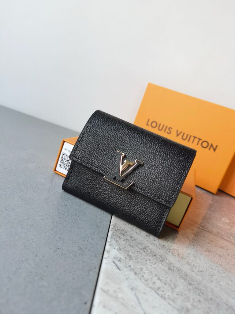 Louis Vuitton Large Black Leather Bag 11 x 10 cm editorial product context 1