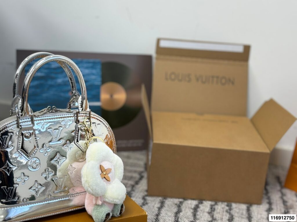 Louis Vuitton Alma Bb Aima Monogram Calfskin Leather Crossbody Bag 18 cm editorial product context 2