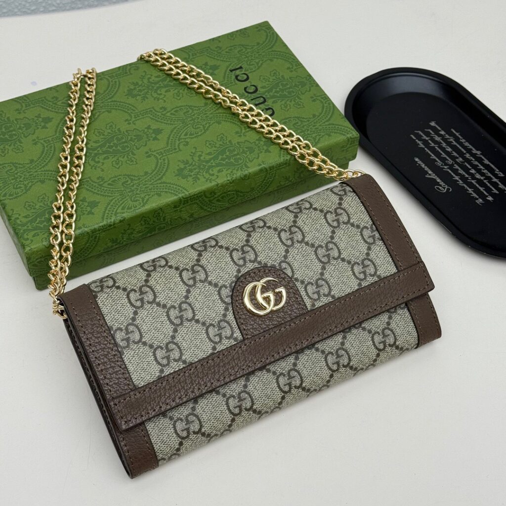 Gucci Guccl Red Clutch editorial product context 2