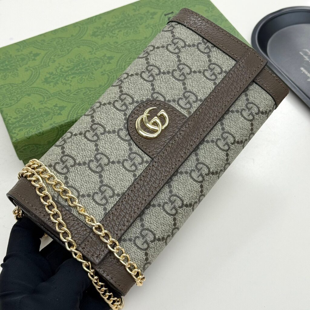 Gucci Guccl Red Clutch editorial product context 3