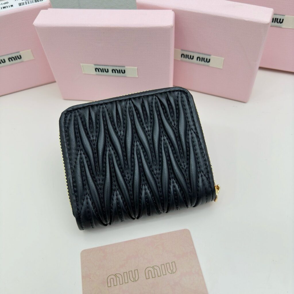 Miu Miu . Black Leather Bag 5 x 10 cm editorial product context 3