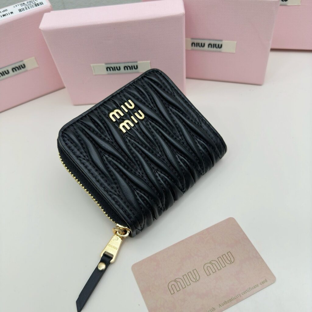 Miu Miu . Black Leather Bag 5 x 10 cm editorial product context 2