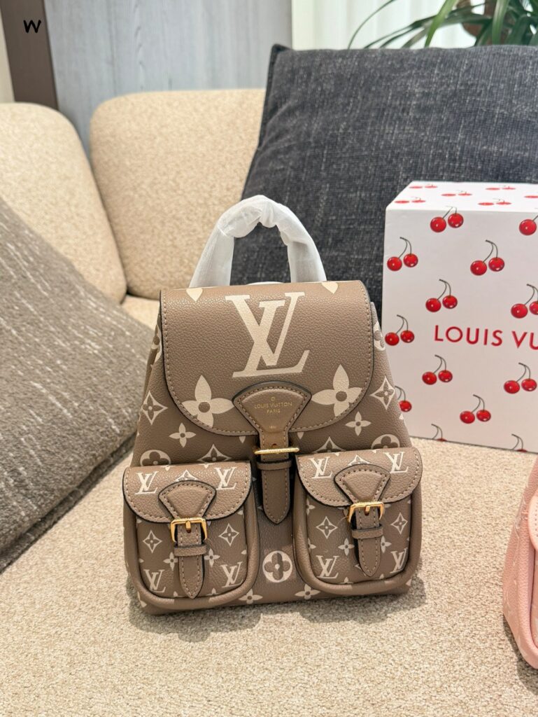 Louis Vuitton Empreinte Tr Sa Yellow Leather Backpack 20 x 25 cm editorial product context 3