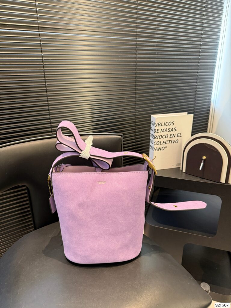 Coach Bleecker Bucket Bag editorial product context 1