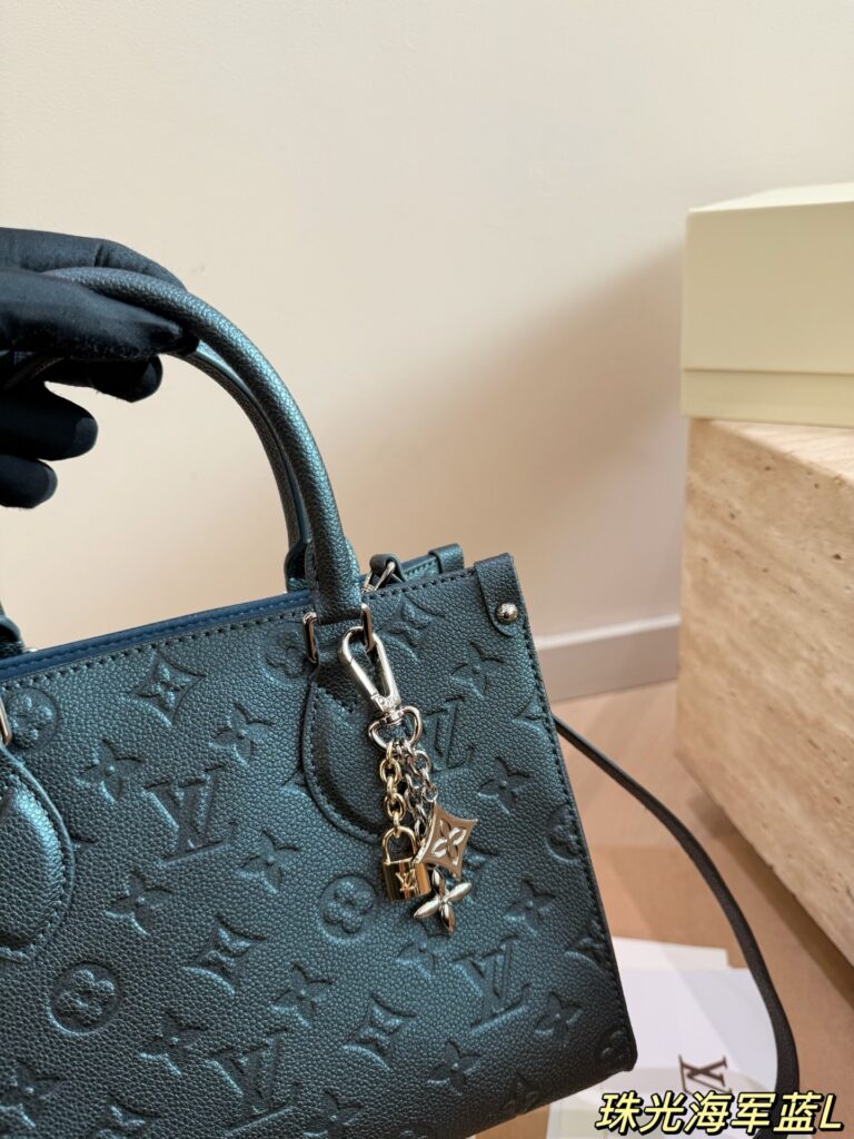 Louis Vuitton P175 onthego Crafty VII ltton Logo Tote Bag editorial product context 2