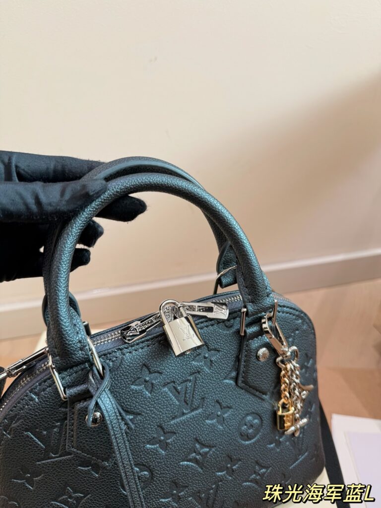 Louis Vuitton Alma Blue Handbag 24 x 18 cm editorial product context 2