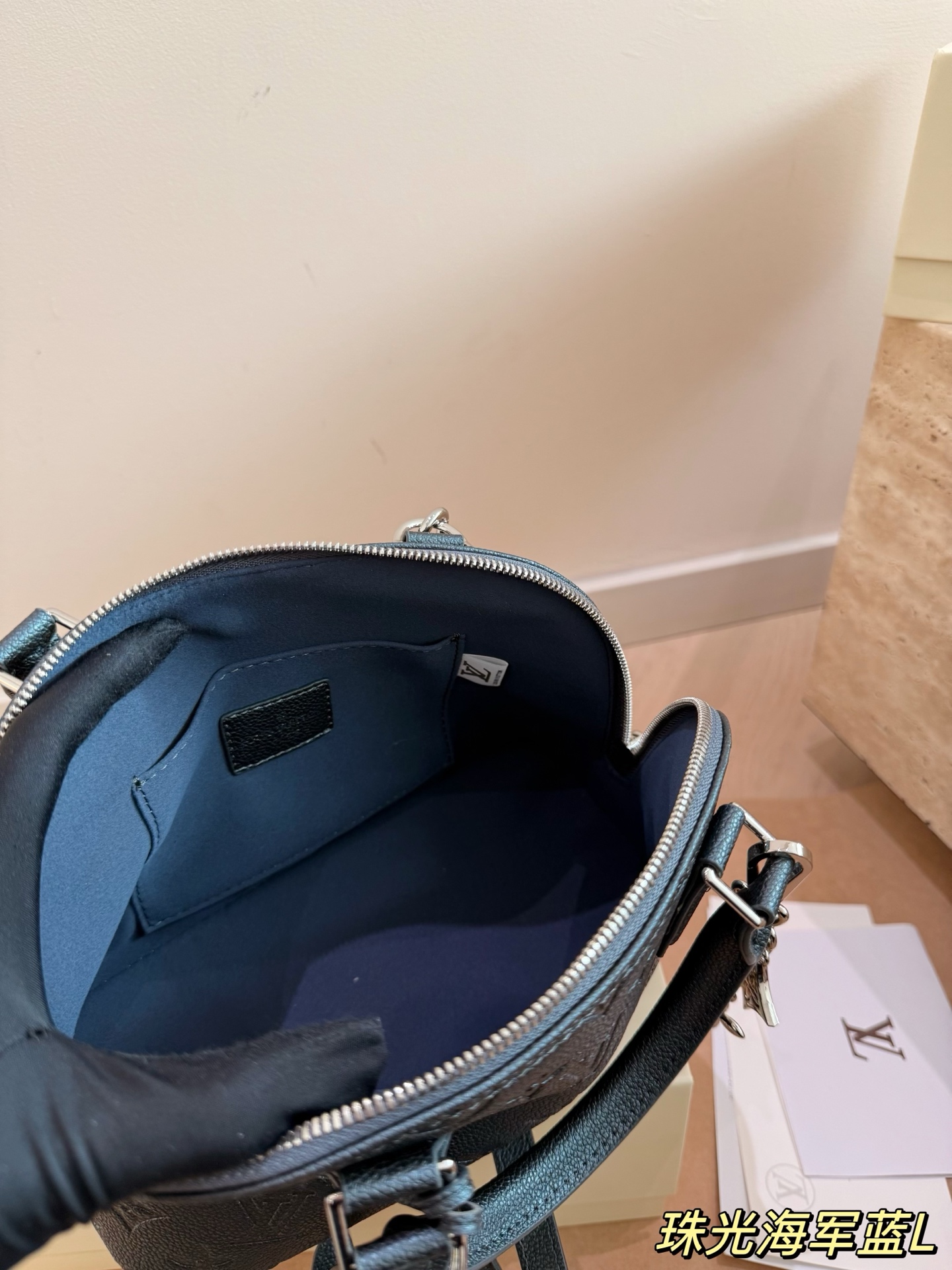 Louis Vuitton Alma handbag