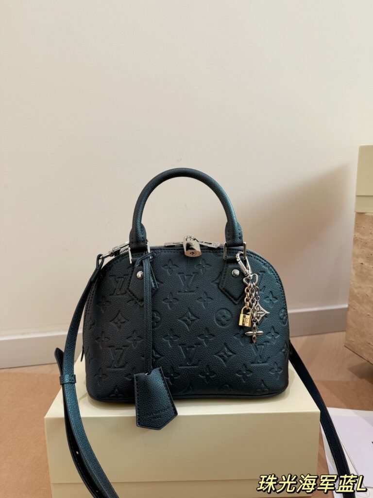 Louis Vuitton Alma Blue Handbag editorial product context 1