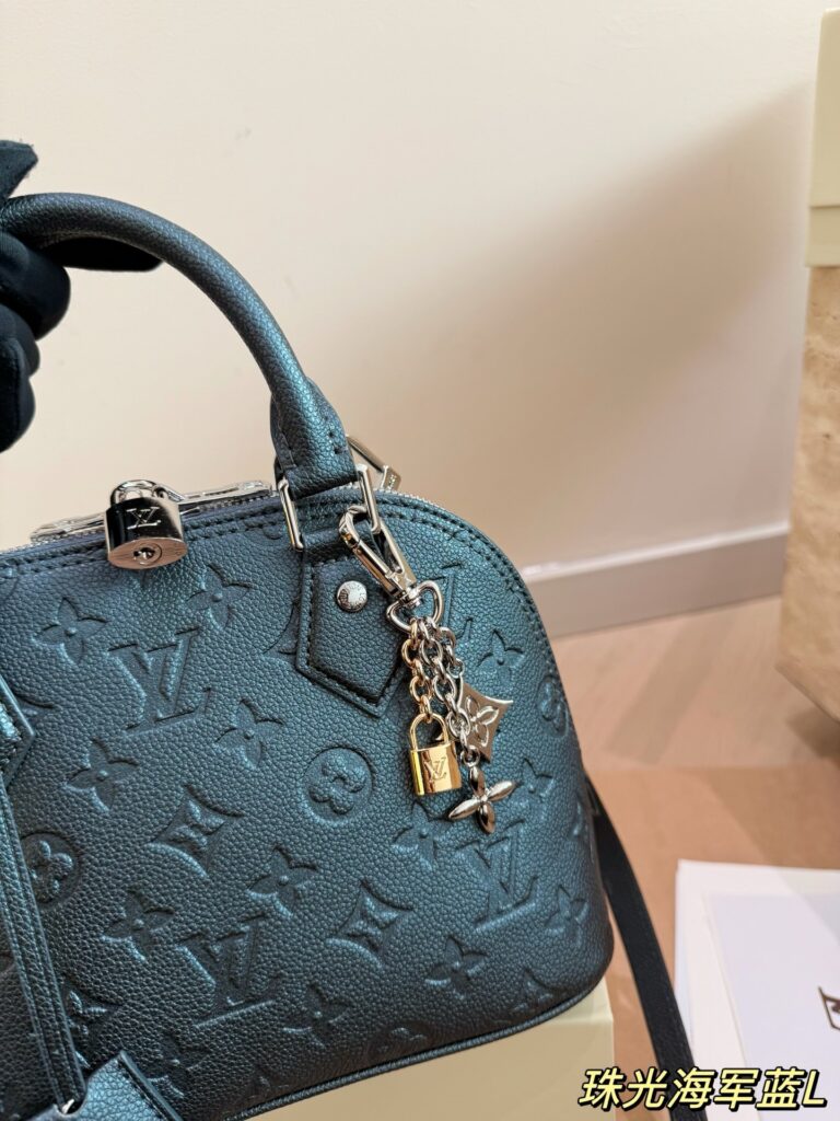 Louis Vuitton Alma Blue Handbag editorial product context 3