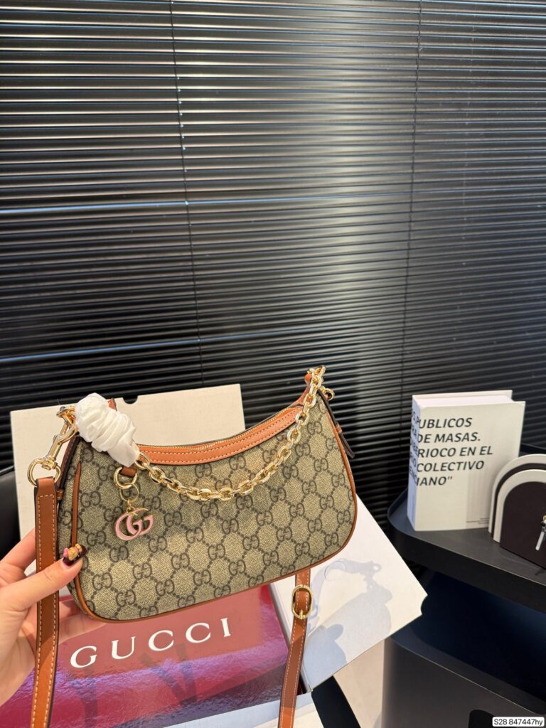 Gucci Gg Emblem Brown Canvas Shoulder Bag editorial product context 2