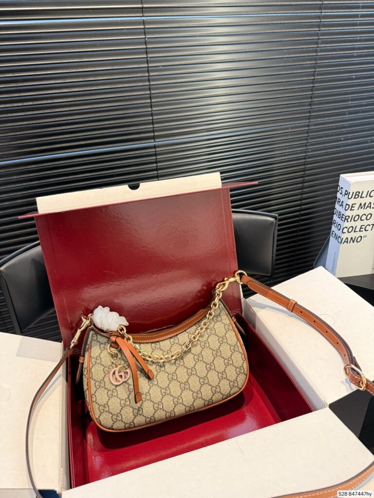 Gucci Gg Emblem Brown Canvas Bag editorial product context 1