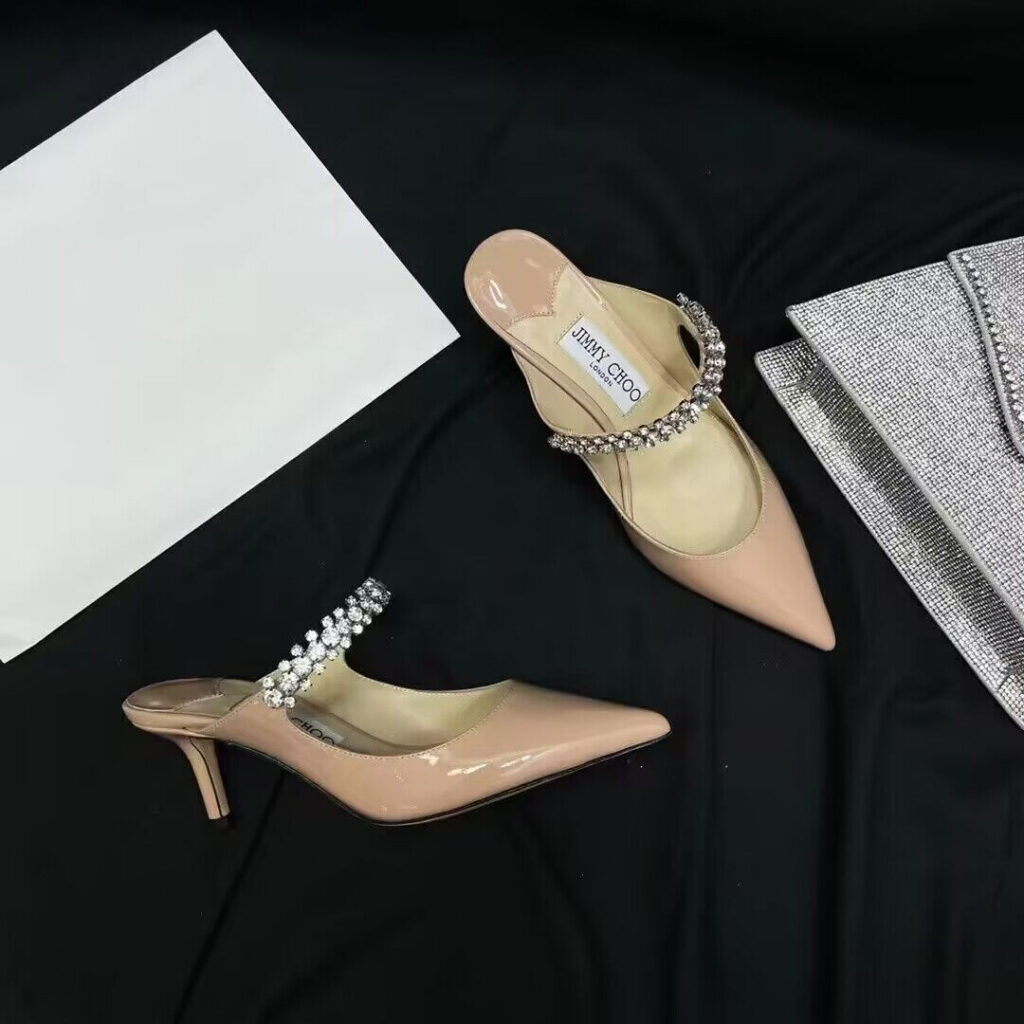 Ji*y Ch* sandals editorial product context 1