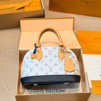 Louis Vuitton Gold Leather Bag