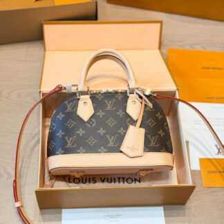 Louis Vuitton Gold Leather Bag