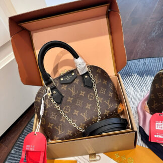 Louis Vuitton Gold Leather Bag