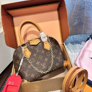 Louis Vuitton Gold Leather Bag